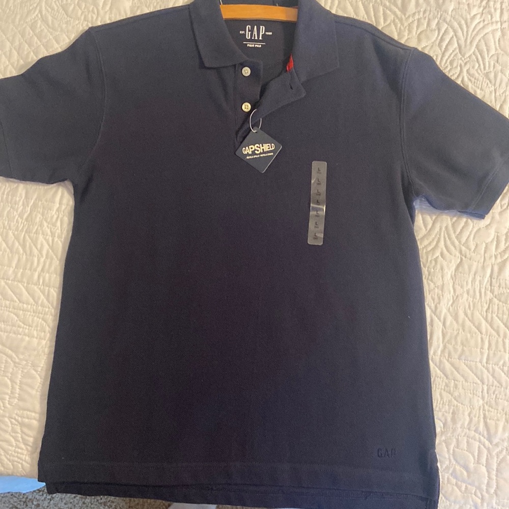 I ate her youth navy blue Pique polo shirt by gap kids